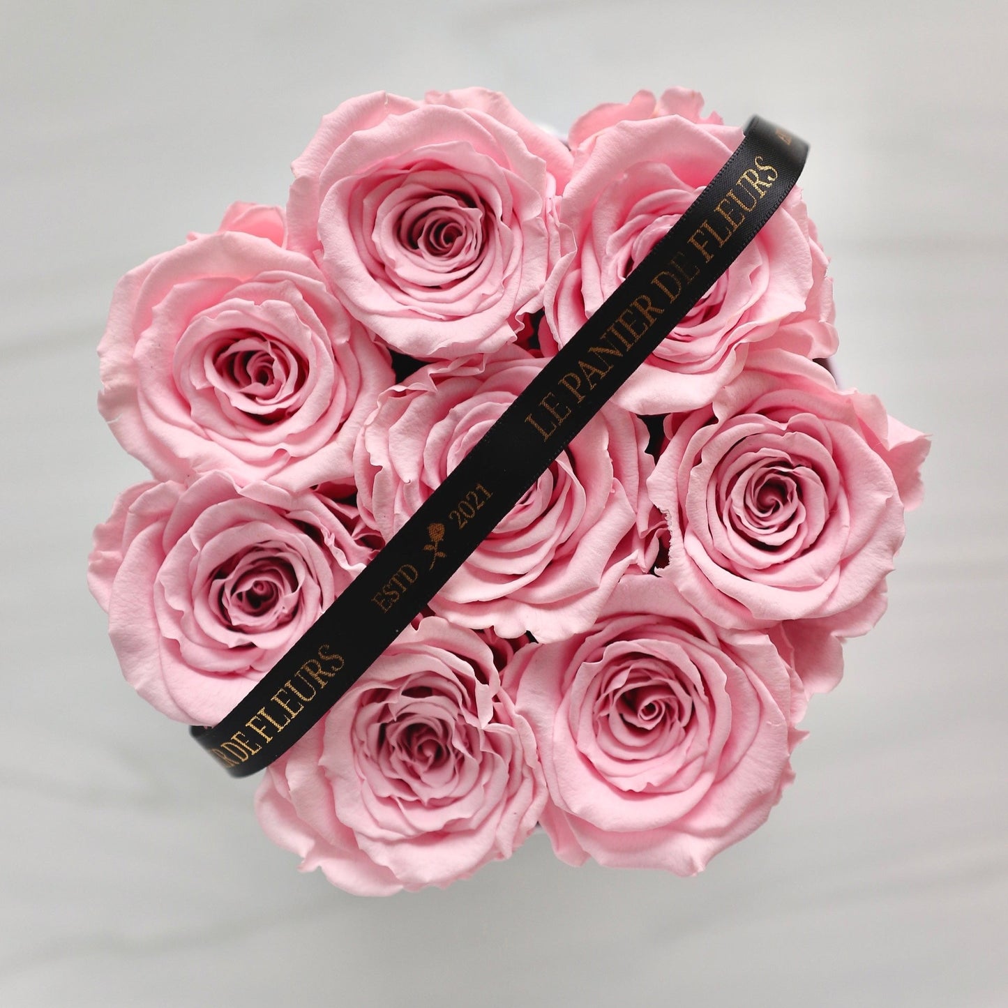 Light Pink Roses in a round box