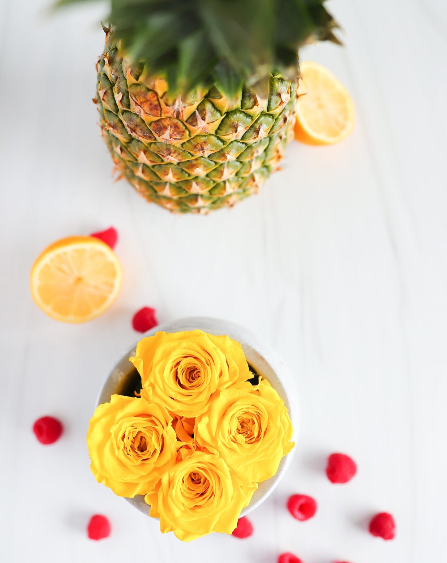4 Yellow Preserved Roses in Cement Vase Centerpiece